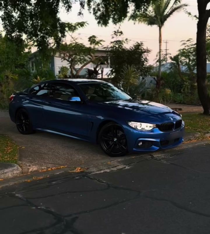 A BMW 430i with a showroom-ready gloss finish after a J-Bros Detailing pre-sale detail on the Gold Coast